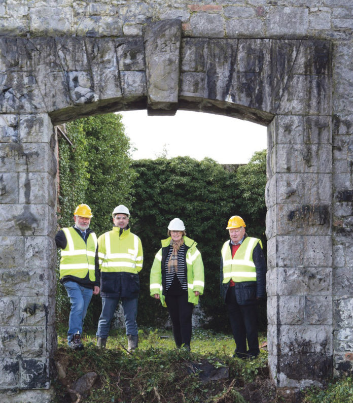 Council Conservation Officer Tom Cassidy, Gas Networks Design Manager Declan Burke, Architectural Consultant Alison Mulqueen and Jimmy O’Donnell of the Limerick Civic Trust at the removal of the archway from the former Gasworks site.