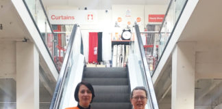 Staff at from Guineys Department Store marking World Autism Day.