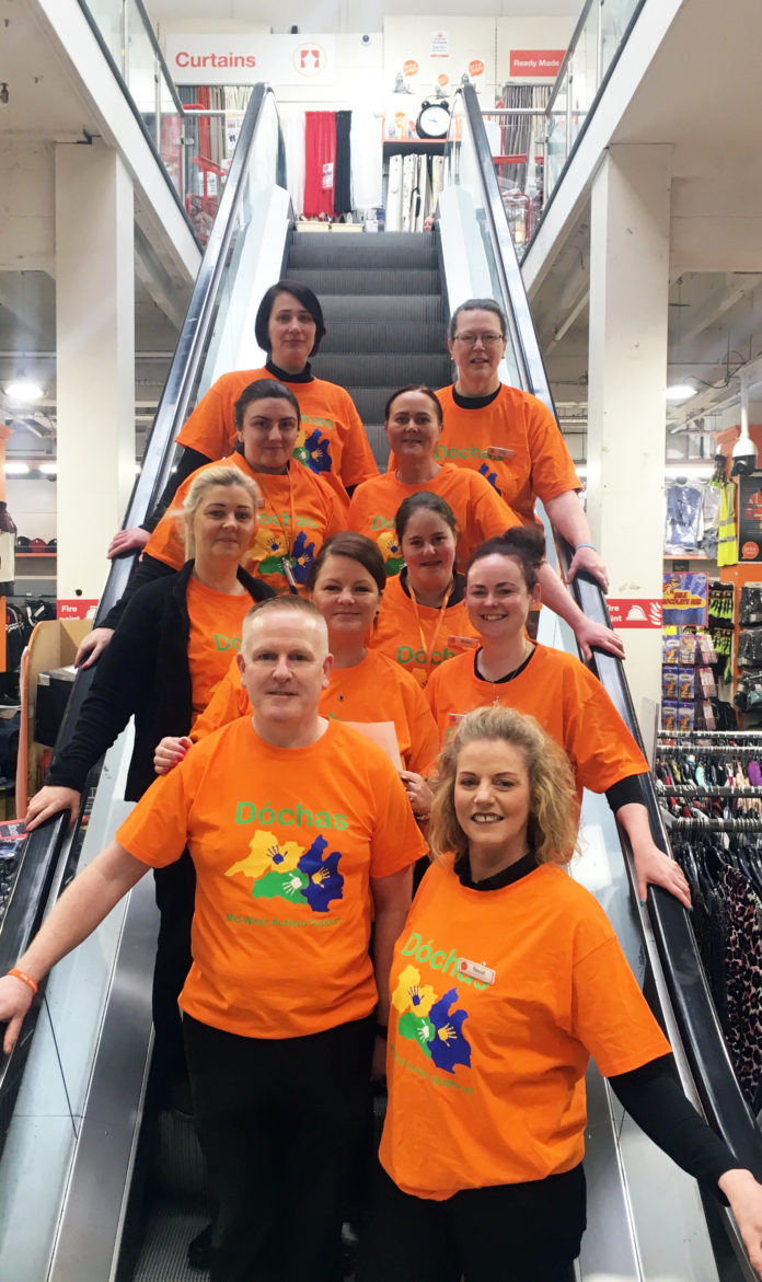Staff at from Guineys Department Store marking World Autism Day.