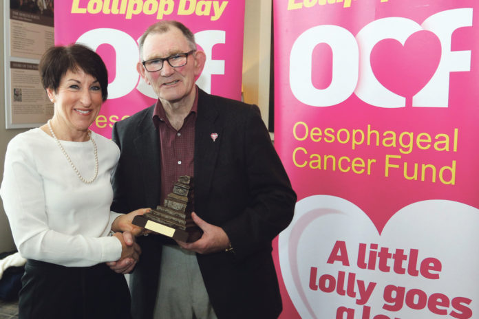 Oesophageal Cancer Fund (OCF) Chief Executive Noelle Ryan making a presentation to Limerick Co-ordinator Noel Walsh in appreciation for his work on behalf of the OCF. Photo: Brendan Gleeson
