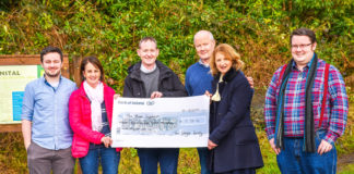 Conor Hayes, Catherine Hayes, Tom Hickey, James Hayes, Margaret Moloney and David Hayes with a cheque for Heart House at the Mater Hospital. Photo: Denis Hickey