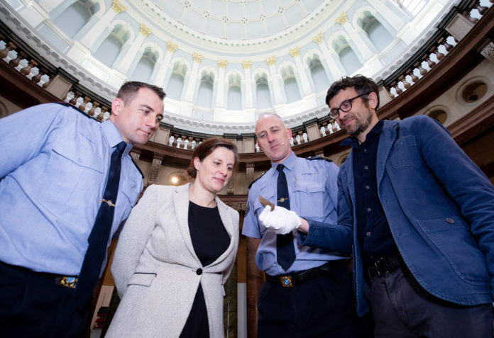 NO FEE NMI DISCOVERIES OF ARTEFACTS JB3 Sergeant Andrew Lacey, Lynn Scarff, Director, National Museum of Ireland, Sergeant Gary Thompson and Matthew Seaver, Assistant Keeper, Irish Antiquities Division, National Museum of Ireland. JULIEN BEHAL PHOTOGRAPHY. NO FEE.
