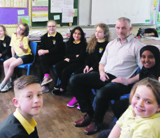 Joe Power of the Limerick Restorative Practice Project with pupils at Scoil Mháthair D on the South Circular Road.