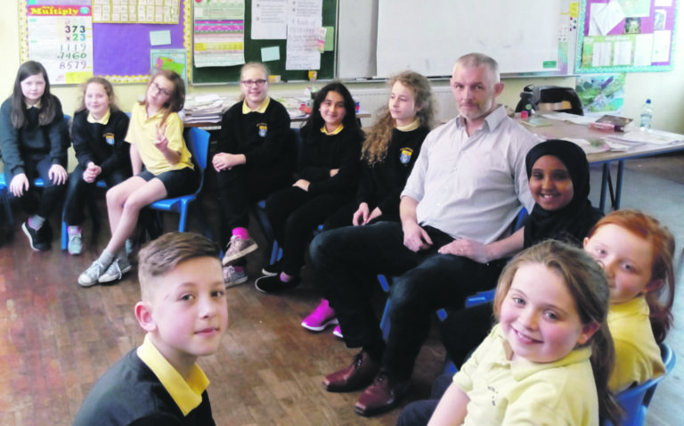Joe Power of the Limerick Restorative Practice Project with pupils at Scoil Mháthair D on the South Circular Road.