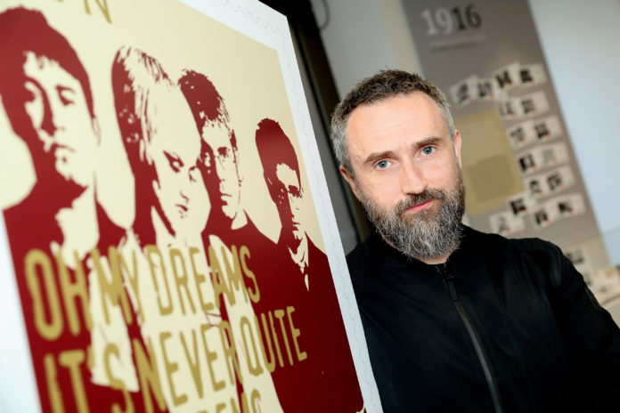 NO FEE ANPOST NW NAT STAMP LCH MX 1 Noel Hogan, pictured with a new national stamp ‘Dreams,’ which features in the set of four stamps from An Post, on the theme ‘Great Irish Songs’. PIC:MAXWELLPHOTOGRAPHY.IE
