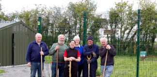 Members of the Limerick Beekeepers Association planting trees to preserve the habitat for swarming.