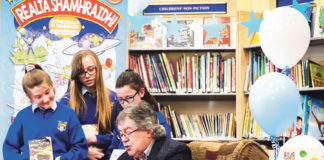 Gabriel Fitzmaurice with Sophie Ni Aodha, Abi Ni Shioda and Ella Ni Challanain at the launch of the Summer Stars scheme in Newcastle West library Photo: Keith Wiseman