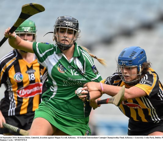 14 September 2014; Rebecca Delee, Limerick, in action against Megan Farrell, Kilkenny. Picture credit: Ramsey Cardy / SPORTSFILE