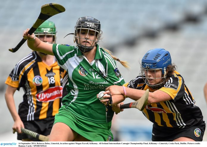 14 September 2014; Rebecca Delee, Limerick, in action against Megan Farrell, Kilkenny. Picture credit: Ramsey Cardy / SPORTSFILE