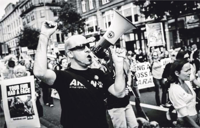 Limerick animal rights activist John Carmody protesting against the fur farming trade. Photo: Marcin Muca