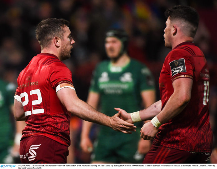 JJ Hanrahan of Munster celebrates with team-mate Calvin Nash after scoring his side's third try during the Guinness PRO14 Round 21 match between Munster and Connacht at Thomond Park in Limerick. Photo by Diarmuid Greene/Sportsfile
