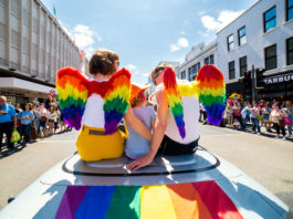 Grand Marshal Moninne Griffith, her wife Clodagh and their daughter Edie leading off the Limerick Pride Parade. Photo: Cian Reinhardt