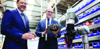 11/01/19. NO FEE. NO REPRO FEE. JULIEN BEHAL PHOTOGRAPHY. Picture shows l-r, Peter Creighton, Managing Director of Reliance and Tánaiste Simon Coveney. Tánaiste Simon Coveney experienced some of the smartest robots in the world making pizzas and performing to music today in Limerick, Friday, January 11th 2019. Fine Gael’s Deputy Leader, officially launched Universal Robot’s partnership with Reliance, a fourth-generation family business that has been providing technical solutions to Irish businesses since 1925. Reliance relocated to its newest state of the art facility last November and have coincided its new contract with Universal Robots to officially open the Limerick hub. JULIEN BEHAL PHOTOGRAPHY. NO FEE. Limerick Post News Business