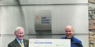 Michael Quinlan presenting a cheque for €9,420, the proceeds of his daffodil day fundraising 2019 to Paul Clements Supporter Services Officer irish Cancer society. This was the largest amount Michael has raised in his 31 years fundraising for Daffodil Day. To date he has raised €137,920