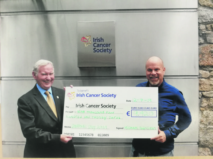 Michael Quinlan presenting a cheque for €9,420, the proceeds of his daffodil day fundraising 2019 to Paul Clements Supporter Services Officer irish Cancer society. This was the largest amount Michael has raised in his 31 years fundraising for Daffodil Day. To date he has raised €137,920