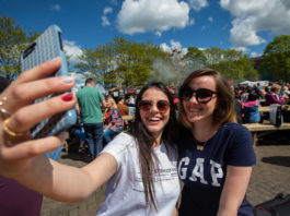 Kaoany and Karin from Brazil soaking up the sunshine at the Riverfest village. Pic Sean Curtin True Media.