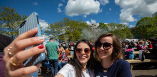 Kaoany and Karin from Brazil soaking up the sunshine at the Riverfest village. Pic Sean Curtin True Media.