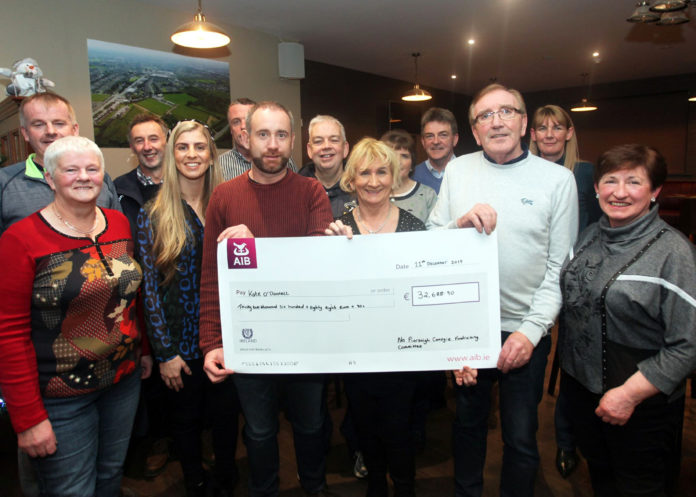 Fundraiser handing over cheque