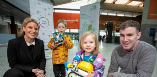 Pictured launching the event at Shannon Airport were Rachael Leahy, Shannon Group Company Secretary and Head of Legal with Séamus Ó Fátharta, Clár TechSpace Coordinator, Camara and 2 year old Ceoladh O’Sullivan from Tralee Co Kerry with her brother Debhinn (4) checking out cool mini robots .Pic Arthur Ellis.