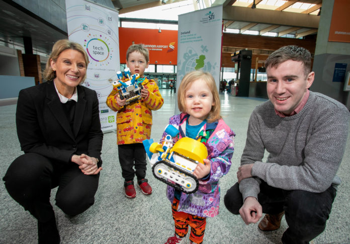 Pictured launching the event at Shannon Airport were Rachael Leahy, Shannon Group Company Secretary and Head of Legal with Séamus Ó Fátharta, Clár TechSpace Coordinator, Camara and 2 year old Ceoladh O’Sullivan from Tralee Co Kerry with her brother Debhinn (4) checking out cool mini robots .Pic Arthur Ellis.