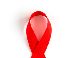 Aids Awareness Red heart Ribbon isolated on white background