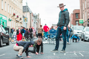 Bruce Harper enjoying Catherine Street with his children, Ryan and Grace. Photo: Cian Reinhardt