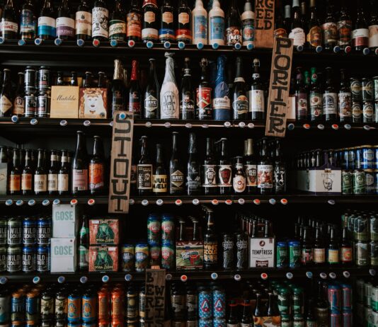 labeled glass bottles on shelf