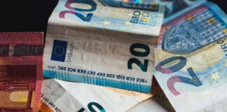 20 euro bill on white textile