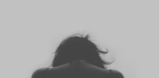 grayscale photo of person's back