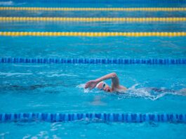 woman swimming on pool