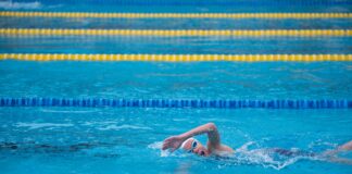 woman swimming on pool