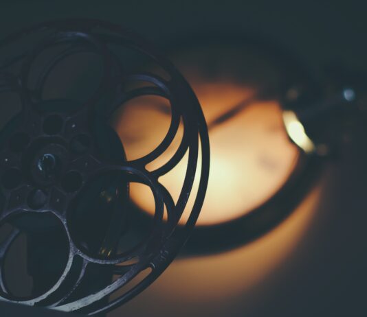 black camera reel player