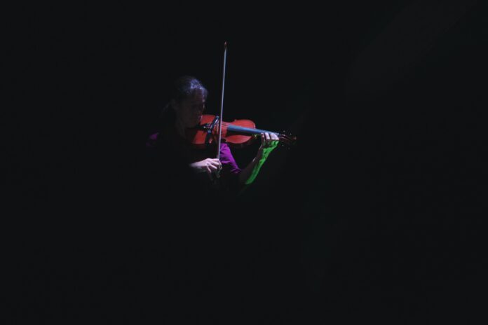 person playing violin