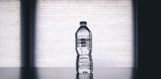 clear drinking bottle filled with water