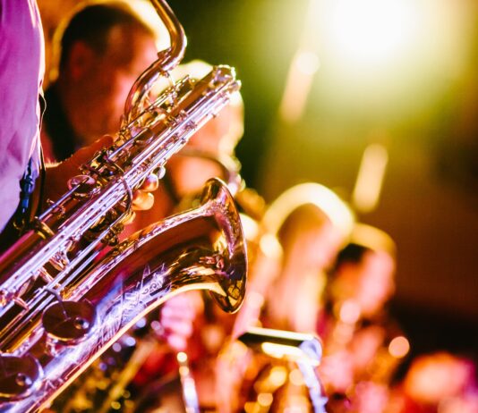 person playing saxophone