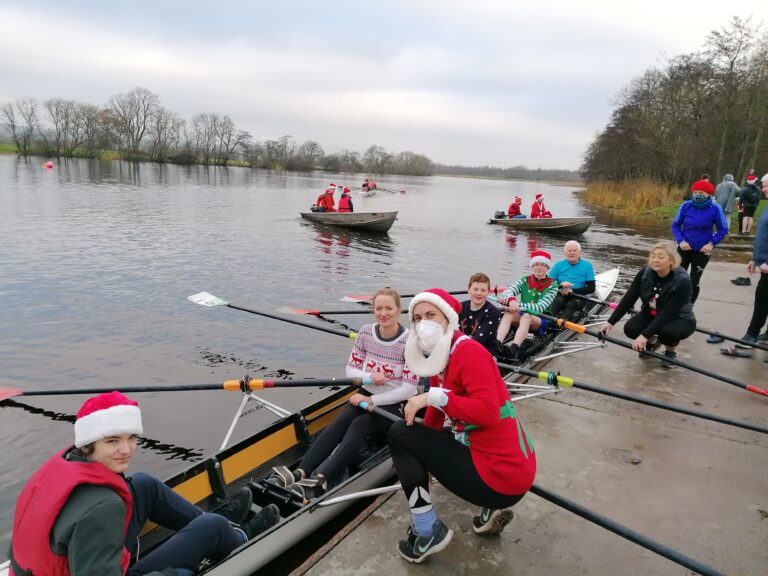 The picture that shows rowing is a sport for all ages