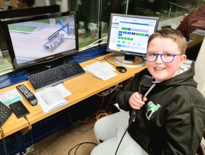 DJ Grimes takes the microphone as he tries his hand at greyhound