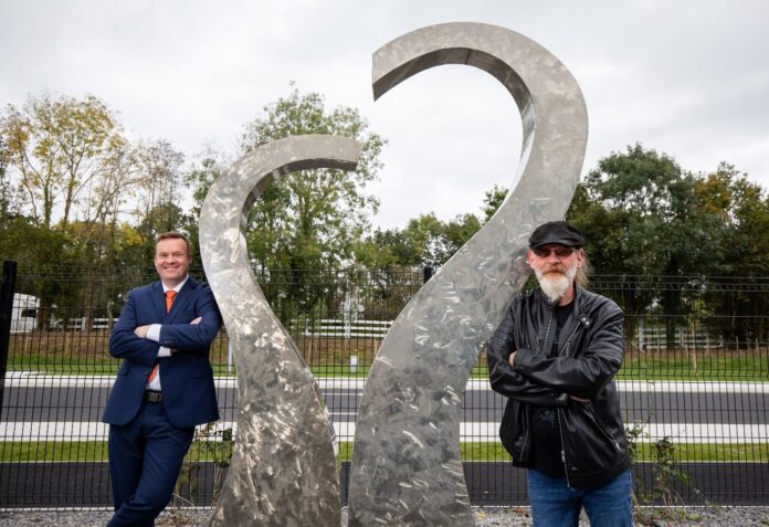 Andrew Walls, Plant General Manager, Edwards Lifesciences Limerick and artist JJ Hegarty.