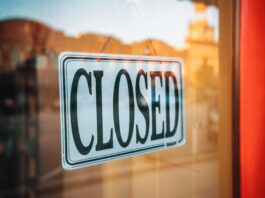 selective focus photography of Closed signage