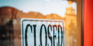 selective focus photography of Closed signage