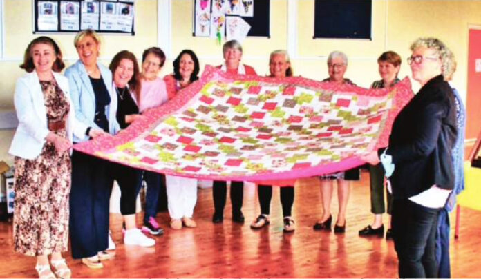 Newport Womens Shed members who worked on the quilt for Milford Hospice.