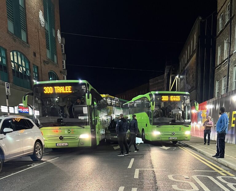 City traffic grinds to a halt in collision involving two busses and a car