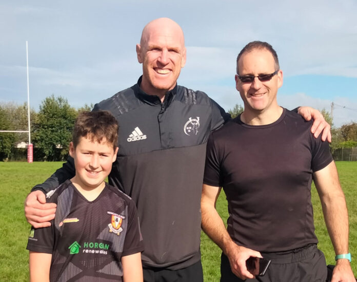 Paddy and Tom O’ Sullivan pictured with sporting legend Paul O'Connell, who paid a recent visit to Newcastle West RFC.