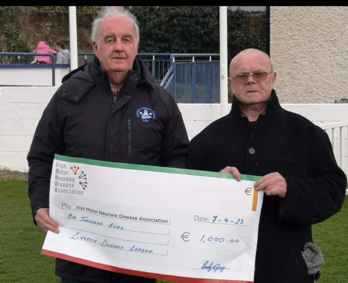 Noel Hanley,LDL Registrar, presenting a cheque to Paddy Duffy of the Irish Motor Neurone Disease Association.