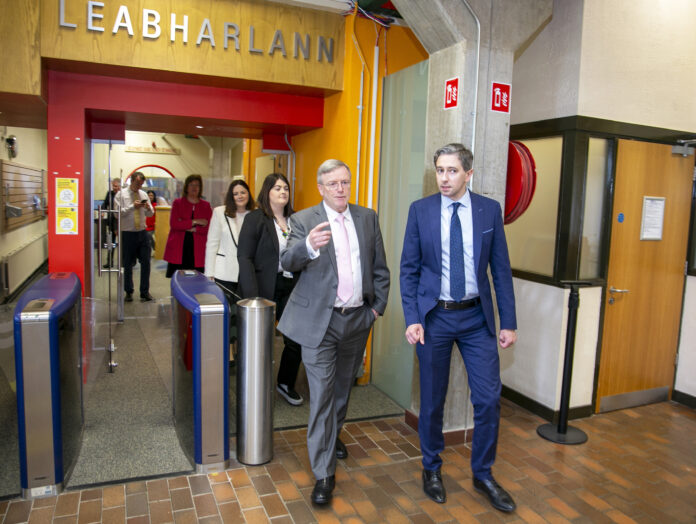 Professor Eugene Wall and Minister Simon Harris pictured at MIC Library