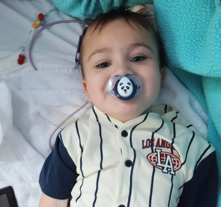 Little Blue Hero Noah battles on with fifth brain surgery in four weeks