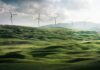 wind turbine surrounded by grass