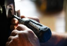 selective focus photography blue and black Makita power drill