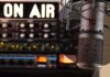 a microphone in front of a sound board