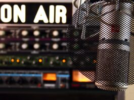 a microphone in front of a sound board